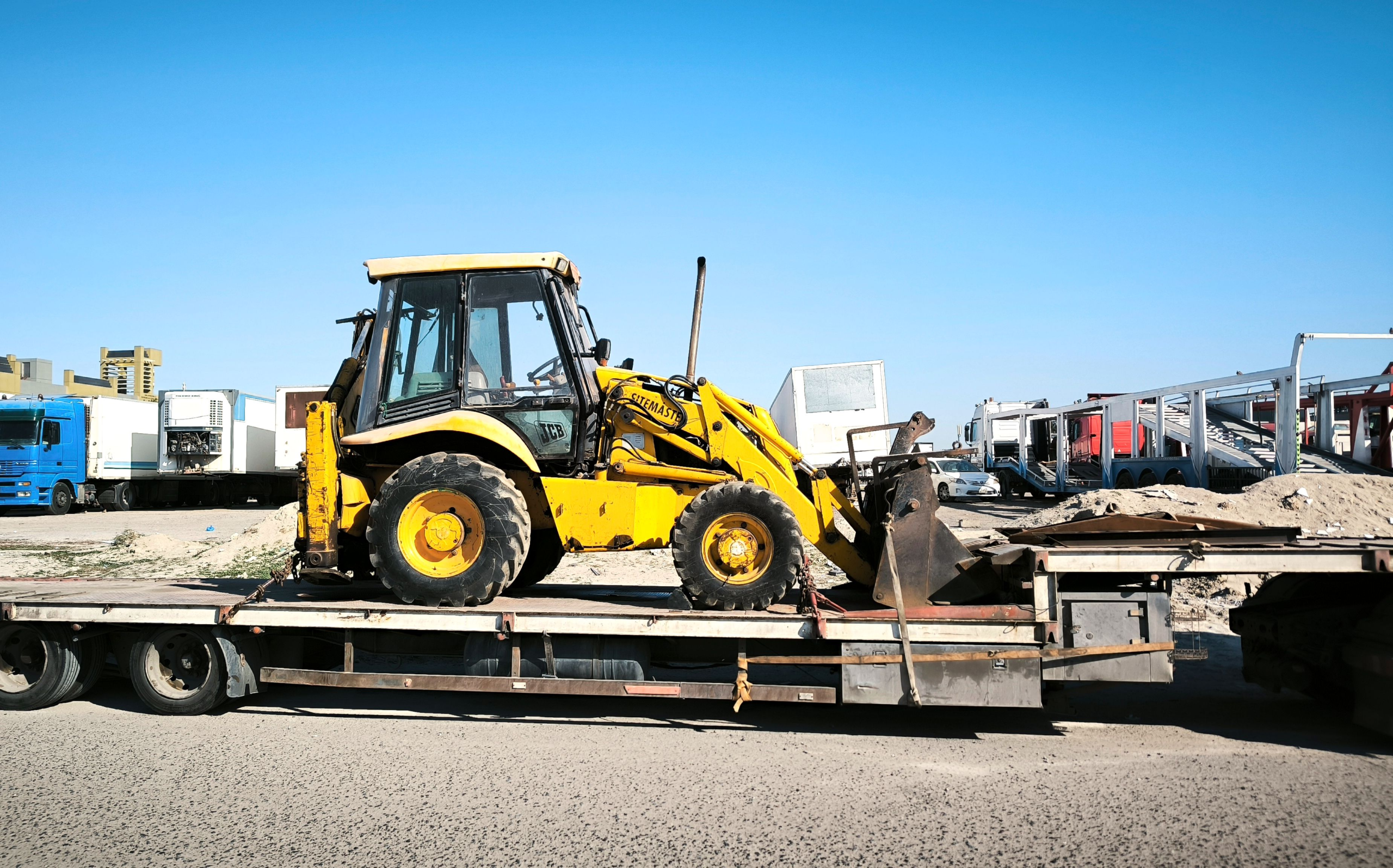 Flatbed stepdeck trailer carrying freight